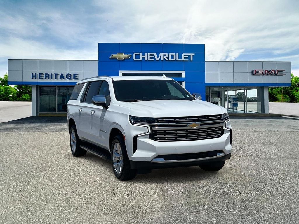 2023 Chevrolet Suburban Premier in Summit White — front three-quarter view