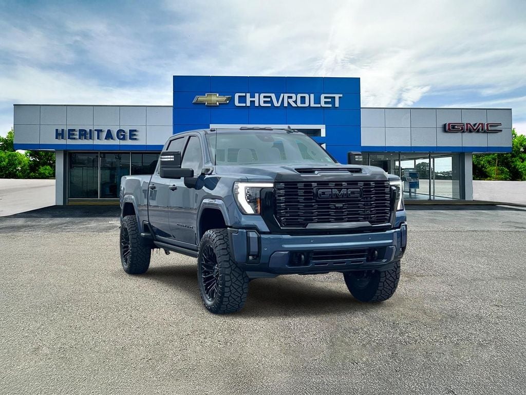 2024 GMC Sierra 2500 HD Denali in Downpour Metallic — front three-quarter view