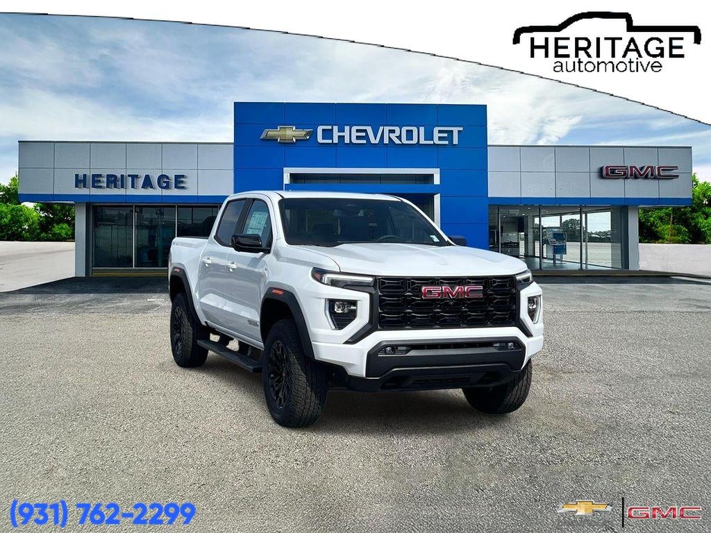 2026 GMC Canyon Elevation in Summit White — front three-quarter view