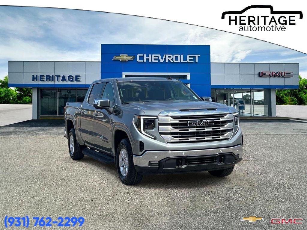 2026 GMC Sierra 1500 SLE in Sterling Metallic — front three-quarter view