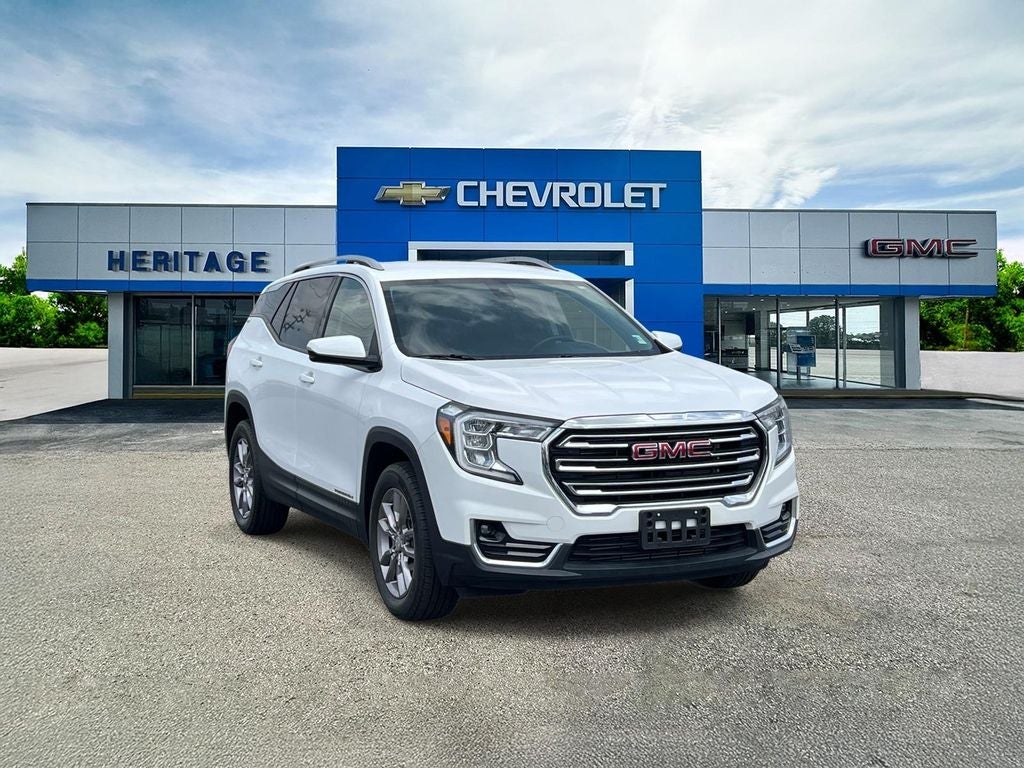 2023 GMC Terrain SLT in Summit White — front three-quarter view