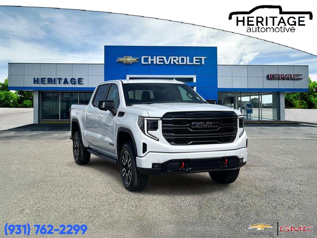 2026 GMC Sierra 1500 AT4 in Summit White — front three-quarter view